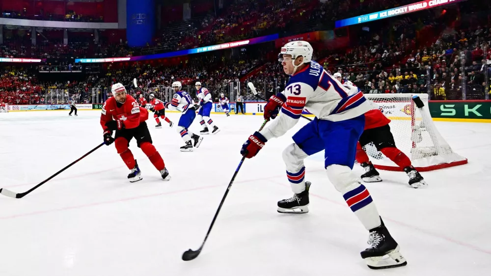 Ice Hockey - IIIHF World Championships - Final - Switzerland v United States - Avicii Arena, Stockholm, Sweden - May 25, 2025 Alex Vlasic of the U.S. in action with Switzerland's Nino Niederreiter Magnus Lejhall/TT News Agency via REUTERS   ATTENTION EDITORS - THIS IMAGE WAS PROVIDED BY A THIRD PARTY. SWEDEN OUT. NO COMMERCIAL OR EDITORIAL SALES IN SWEDEN.