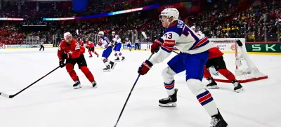 Ice Hockey - IIIHF World Championships - Final - Switzerland v United States - Avicii Arena, Stockholm, Sweden - May 25, 2025 Alex Vlasic of the U.S. in action with Switzerland's Nino Niederreiter Magnus Lejhall/TT News Agency via REUTERS   ATTENTION EDITORS - THIS IMAGE WAS PROVIDED BY A THIRD PARTY. SWEDEN OUT. NO COMMERCIAL OR EDITORIAL SALES IN SWEDEN.