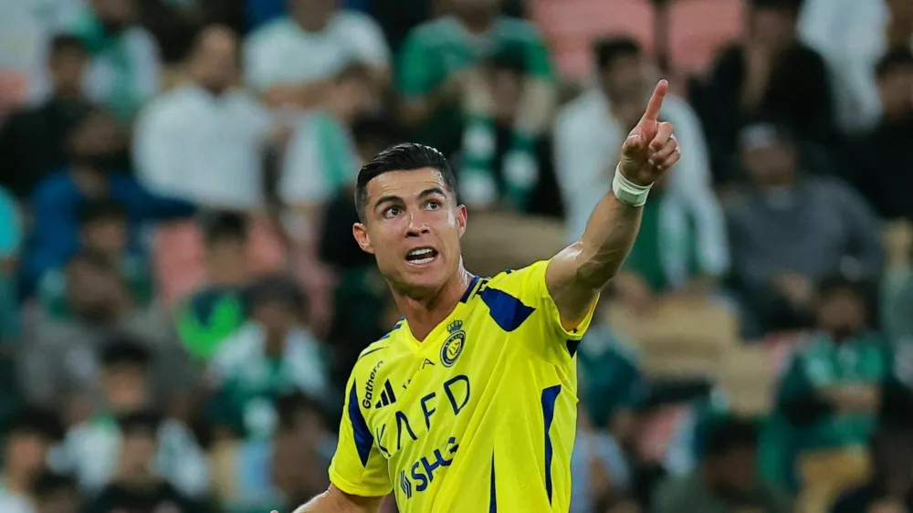Soccer Football - Saudi Pro League - Al Ahli v Al Nassr - King Abdullah Sports City, Jeddah, Saudi Arabia - February 13, 2025 Al Nassr's Cristiano Ronaldo reacts after being substituted REUTERS/Stringer