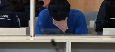 27 May 2025, North Rhine-Westphalia, Duesseldorf: The accused in the courtroom of the Higher Regional Court. Syrian Issa Al H. (27) is accused of stabbing three people to death at the "Festival of Diversity" city festival. The accused is charged with three counts of murder, ten counts of attempted murder and membership of a terrorist organization. Photo: Federico Gambarini/dpa