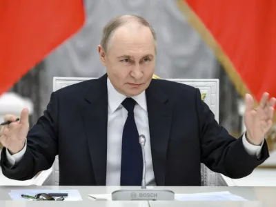 Russian President Vladimir Putin holds a meeting with members of Russia's business community at the Kremlin in Moscow, Russia, Monday, May 26, 2025. (Grigory Sysoyev, Sputnik, Kremlin Pool Photo via AP)
