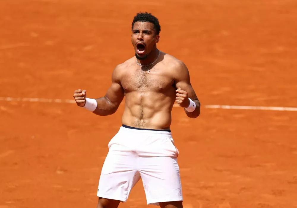 Tennis - French Open - Roland Garros, Paris, France - May 29, 2025 France's Arthur Fils celebrates after winning his second round match against Spain's Jaume Munar REUTERS/Lisi Niesner