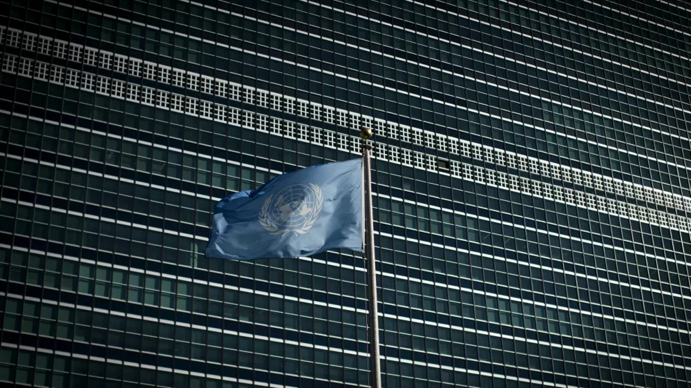 FILE PHOTO: The United Nations flag flies in front of the Secretariat Building at the United Nations headquarters in New York City September 18, 2015. REUTERS/Mike Segar/File Photo