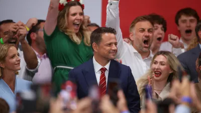 Civic Coalition presidential candidate, Warsaw Mayor Rafal Trzaskowski watches the exit poll announcement of the second round of presidential election, during the election evening, in Warsaw, Poland, June 1, 2025. REUTERS/Kacper Pempel