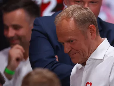 Civic Coalition's Polish Prime Minister Donald Tusk reacts after the exit poll announcement of the second round of presidential election in Warsaw, Poland, June 1, 2025. REUTERS/Kacper Pempel
