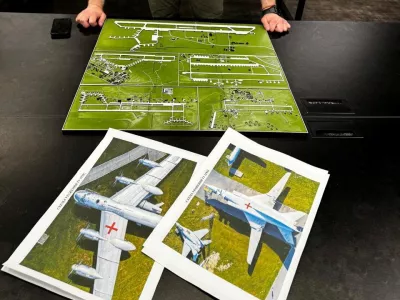 Head of the Ukraine's Security Service Vasyl Maliuk looks at a map of an airfield, amid Russia's attack on Ukraine, in an unknown location in Ukraine, in this handout picture released June 1, 2025. Press service of the Security Service of Ukraine/Handout via REUTERS ATTENTION EDITORS - THIS IMAGE HAS BEEN SUPPLIED BY A THIRD PARTY.