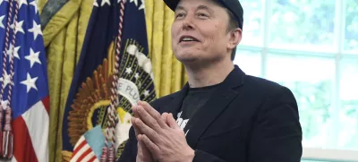 Elon Musk gestures as he speaks during a news conference with President Donald Trump in the Oval Office of the White House, Friday, May 30, 2025, in Washington. (AP Photo/Evan Vucci)