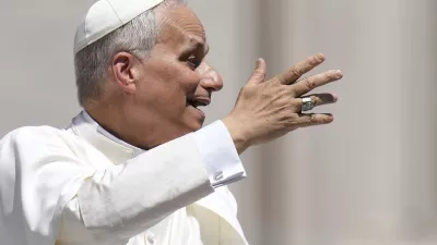 Pope Leo XIV gestures as he leaves after his weekly general audience in St. Peter's Square at The Vatican, Wednesday, June 4, 2025. (AP Photo/Gregorio Borgia)