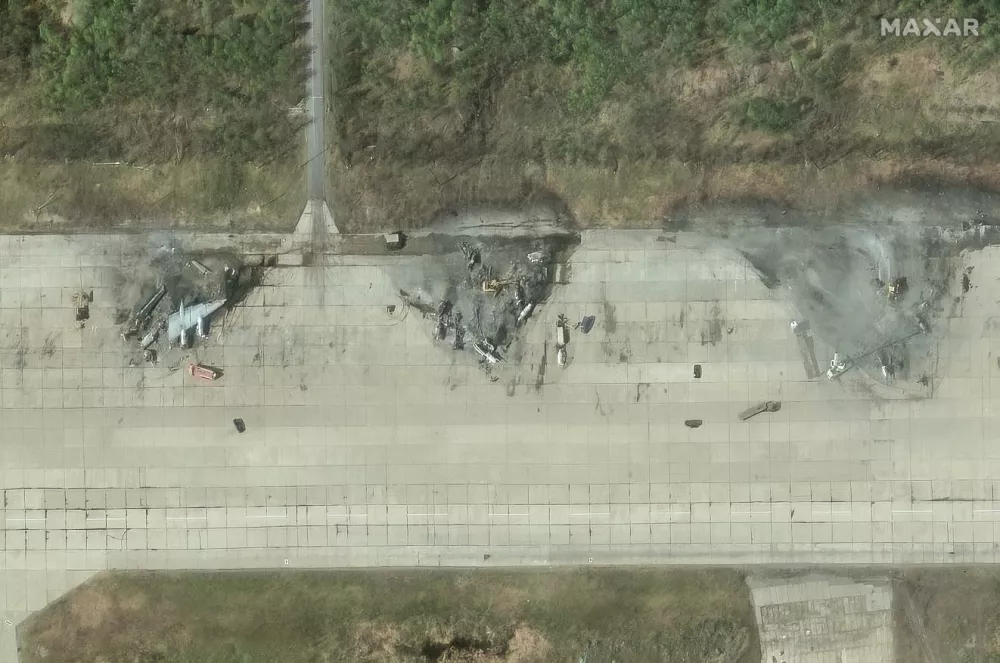 A satellite image shows destroyed aircrafts in the aftermath of a drone strike at the Olenya air base, Murmansk region, Russia, June 4, 2025, Maxar Technologies/Handout via REUTERS THIS IMAGE HAS BEEN SUPPLIED BY A THIRD PARTY. NO RESALES. NO ARCHIVES. MANDATORY CREDIT. MUST NOT OBSCURE LOGO.