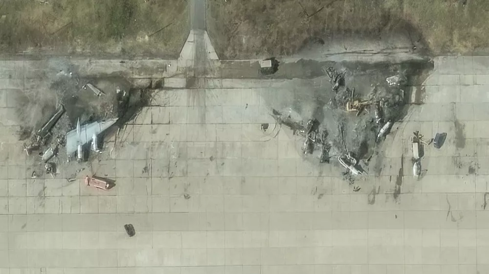 A satellite image shows destroyed TU 95 aircrafts in the aftermath of a drone strike at the Olenya air base, Murmansk region, Russia, June 4, 2025, Maxar Technologies/Handout via REUTERS THIS IMAGE HAS BEEN SUPPLIED BY A THIRD PARTY. NO RESALES. NO ARCHIVES. MANDATORY CREDIT. MUST NOT OBSCURE LOGO.