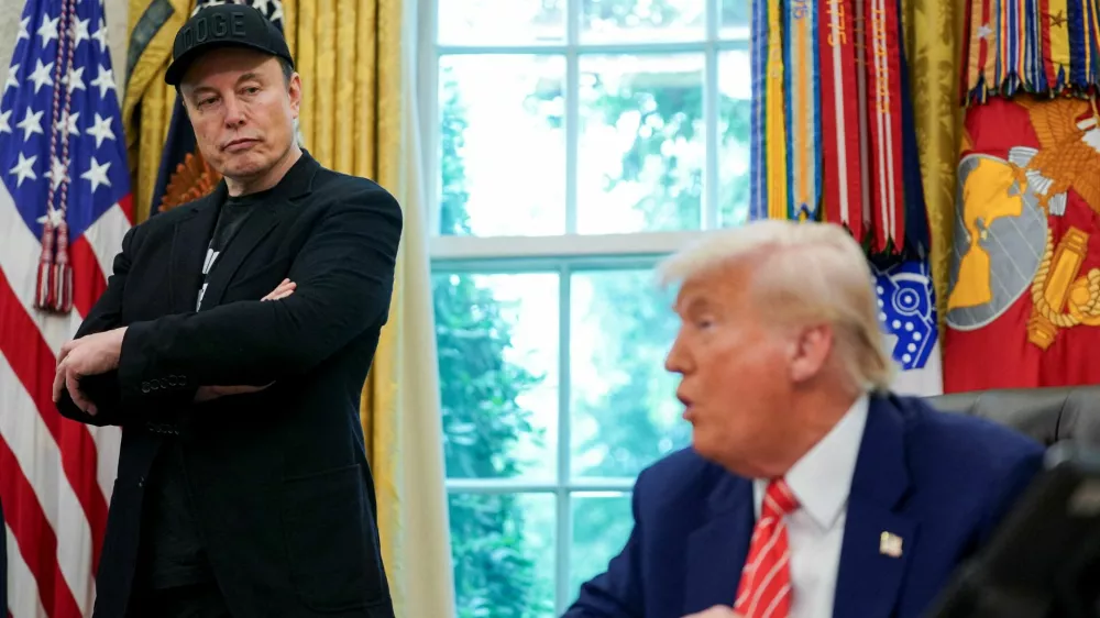 FILE PHOTO: U.S. President Donald Trump and Elon Musk attend a press conference in the Oval Office of the White House in Washington, D.C., U.S., May 30, 2025. REUTERS/Nathan Howard/File Photo