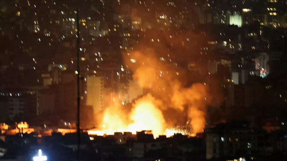 Smoke and flames rise, following an Israeli strike on Beirut's southern suburbs, after the Israeli military issued an evacuation warning for the area, as seen from Baabda, Lebanon, June 5, 2025. REUTERS/Mohamed Azakir