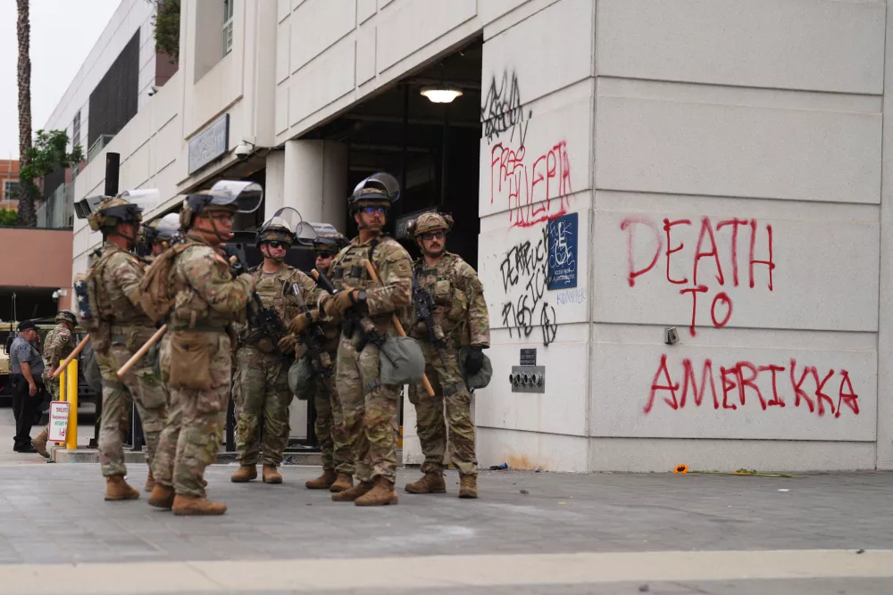 U.S. National Guard are deployed around downtown Los Angeles, Sunday, June 8, 2025, following a immigration raid protest the night before. (AP Photo/Eric Thayer)