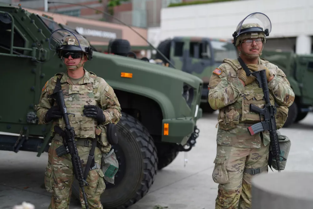 U.S. National Guard are deployed around downtown Los Angeles, Sunday, June 8, 2025, following an immigration raid protest the night before. (AP Photo/Eric Thayer)