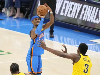 Jun 8, 2025; Oklahoma City, Oklahoma, USA; Oklahoma City Thunder guard Shai Gilgeous-Alexander (2) shoots the ball against Indiana Pacers center Thomas Bryant (3) during the second half during game two of the 2025 NBA Finals at Paycom Center. Mandatory Credit: Kyle Terada-Imagn Images