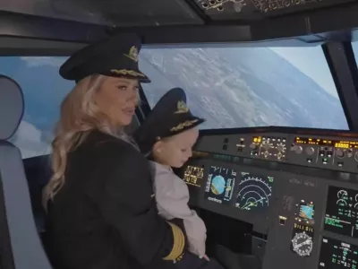 Maja Šuput s sinom Bloomom na simulatorju letenja. F instagram