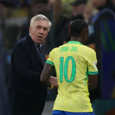 Soccer Football - World Cup - South American Qualifiers - Brazil v Paraguay - Neo Quimica Arena, Sao Paulo, Brazil - June 10, 2025 Brazil coach Carlo Ancelotti and Vinicius Junior REUTERS/Jorge Silva