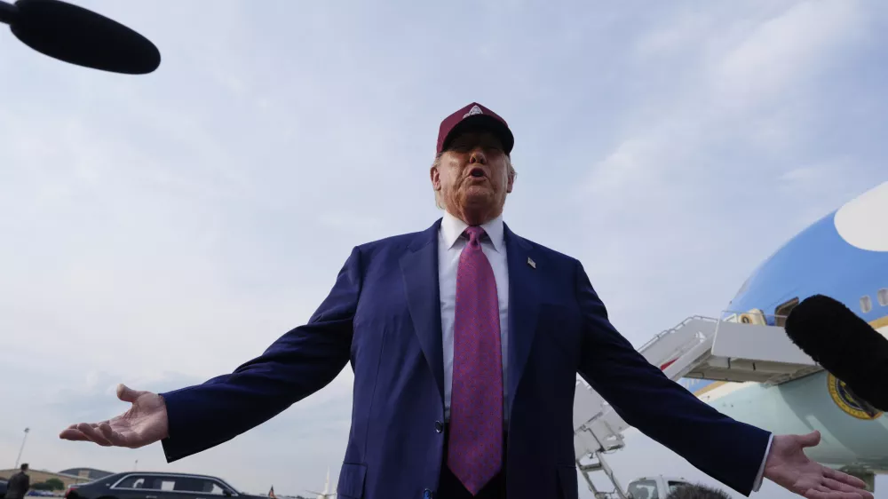 President Donald Trump speaks to reporters after arriving on Air Force One, Tuesday, June 10, 2025, at Joint Base Andrews, Md. (AP Photo/Alex Brandon)