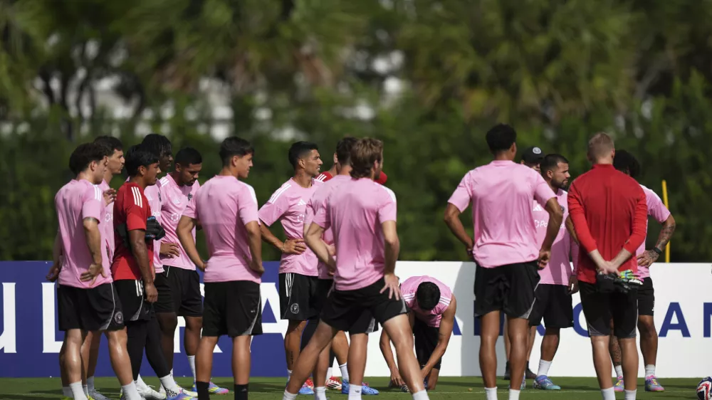 Inter Miami players including forward Luis Suarez, center left, gather for a training session three days ahead of the team's opening Club World Cup soccer match against Al Ahly, Wednesday, June 11, 2025, in Fort Lauderdale, Fla. (AP Photo/Rebecca Blackwell)