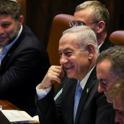 Israeli Prime Minister Benjamin Netanyahu, Foreign Minister Israel Katz and Israeli Finance Minister Bezalel Smotrich attend a Plenum session of the Knesset, Israel's Parliament, in Jerusalem, June 11, 2025 REUTERS/Ronen Zvulun