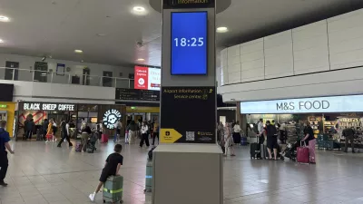 The time of 18:25 is displayed on an information sign when the Air India jet that crashed in Ahmedabad, India, was due to land at Gatwick Airport near London, Thursday, June 12, 2025. (AP Photo/Kin Cheung)