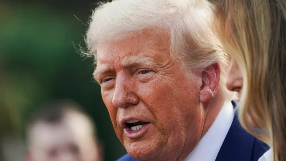FILE PHOTO: U.S. President Donald Trump attends the Congressional Picnic at the White House in Washington, D.C., U.S., June 12, 2025. REUTERS/Nathan Howard/File Photo