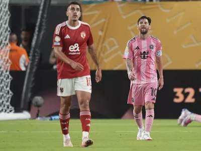 Inter Miami's Lionel Messi, right, and Al Ahly's Nejc Gradisar leaves the pitch at the end of the Club World Cup group A soccer match between Al Ahly and Inter Miami in Miami, Fla., Saturday, June 14, 2025. (AP Photo/Rebecca Blackwell)