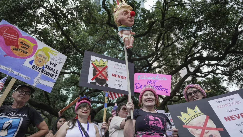 People gather in Houston for the "No Kings" nationwide demonstration on Saturday, June 14, 2025. (Raquel Natalicchio/Houston Chronicle via AP)