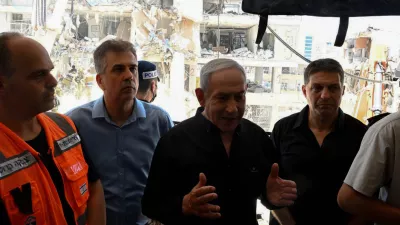 HANDOUT - 15 June 2025, Israel, Bat Yam: Israeli Prime Minister Benjamin Netanyahu visits the sites attacked by Iranian missiles in Bat Yam. Photo: Avi Ohayon/GPO/dpa - ATTENTION: editorial use only and only if the credit mentioned above is referenced in full