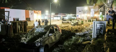 Security and rescue personnel work at an impact site following missile attack from Iran on Israel, at Zavdiel, Israel, June 15, 2025. REUTERS/Itay Cohen
