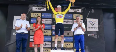 14 June 2025, France, Mont-Cenis: Slovenian cyclist Tadej Pogacar of UAE Team Emirates XRG celebrates on the podium after winning the 8th and final stage of the 77th edition of the Criterium du Dauphine cycling race, 133.3 km from Val-d'Arc-Val-Cenis to Plateau du Mont Cenis. Photo: Stefano Cavasino/LiveMedia-IPA/ZUMA Press Wire/dpa