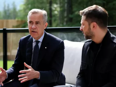 Canadian Prime Minister Mark Carney and Ukrainian President Volodymyr Zelenskiy attend a meeting during the G7 Leaders' Summit in Kananaskis, in Alberta, Canada, June 17, 2025. REUTERS/Suzanne Plunkett/Pool