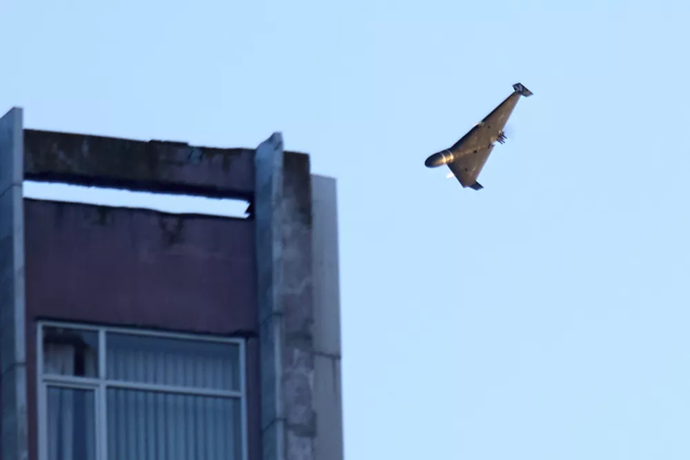 A Russian drone attacks a building during Russia's massive missile and drone air attack in Kyiv, Ukraine, Tuesday, June 17, 2025. (AP Photo/Efrem Lukatsky)
