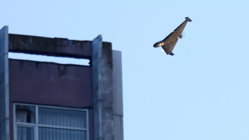 A Russian drone attacks a building during Russia's massive missile and drone air attack in Kyiv, Ukraine, Tuesday, June 17, 2025. (AP Photo/Efrem Lukatsky)