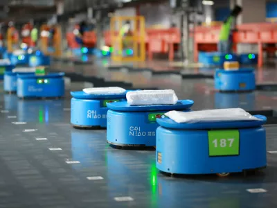 ﻿Robots operated by Alibaba's logistics unit Cainiao, move parcels at a new automated guided vehicles (AGV) warehouse inside the hub of delivery company YTO Express, in Hangzhou, Zhejiang province, China September 14, 2018. Picture taken September 14, 2018. REUTERS/Stringer ATTENTION EDITORS - THIS IMAGE WAS PROVIDED BY A THIRD PARTY. CHINA OUT.