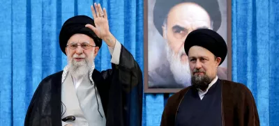 FILE PHOTO: Ayatollah Ruhollah Khomeini's grandson, Hassan Khomeini stands next to Iran's Supreme Leader Ayatollah Ali Khamenei during the 36th anniversary of the death of the leader of Iran's 1979 Islamic Revolution, Ayatollah Ruhollah Khomeini, at Khomeini's shrine in southern Tehran, Iran June 4, 2025. Office of the Iranian Supreme Leader/WANA (West Asia News Agency)/Handout via REUTERS ATTENTION EDITORS - THIS PICTURE WAS PROVIDED BY A THIRD PARTY/File photo