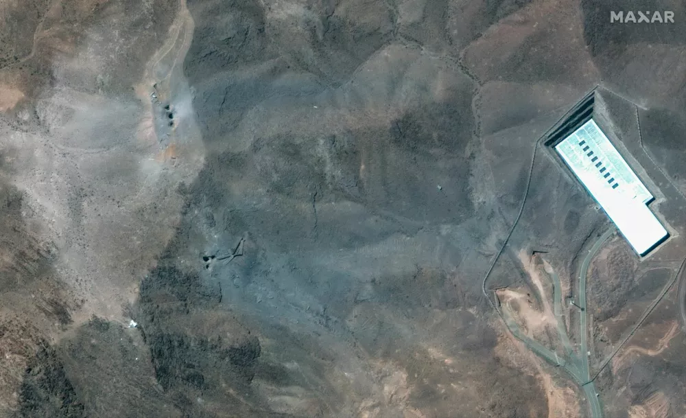 A closer satellite view shows the ridge at Fordow underground complex, after the U.S. struck the underground nuclear facility, near Qom, Iran June 22, 2025.   MAXAR TECHNOLOGIES/Handout via REUTERS  THIS IMAGE HAS BEEN SUPPLIED BY A THIRD PARTY. NO RESALES. NO ARCHIVES. MANDATORY CREDIT. DO NOT OBSCURE LOGO.