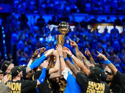 Jun 22, 2025; Oklahoma City, Oklahoma, USA; The Oklahoma City Thunder lift the Larry O'Brien Championship Trophy as they celebrate after winning game seven of the 2025 NBA Finals against the Indiana Pacers at Paycom Center. Mandatory Credit: Kyle Terada-Imagn Images
