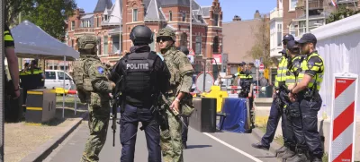 Security patrol around the perimeter of the venue in The Hague, Netherlands, Monday, June 23, 2025 ahead of the upcoming NATO summit. (AP Photo/Patrick Post)