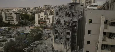 Israeli soldiers and rescue team work amid the rubble of residential buildings destroyed by an Iranian missile strike that killed several people, in Beersheba, Israel, on Tuesday, June 24, 2025. (AP Photo/Leo Correa)