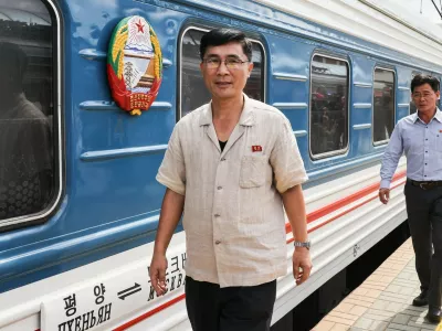 RUSSIA, MOSCOW - JUNE 25, 2025: Employees of the Korean State Railway are seen as the Pyongyang - Moscow passenger train arrives at the Yaroslavsky railway station. The train service between Pyongyang and Moscow has resumed after a five-year suspension due to the COVID-19 pandemic,Image: 1014894016, License: Rights-managed, Restrictions: * Switzerland And Russia Rights Out *, Model Release: no