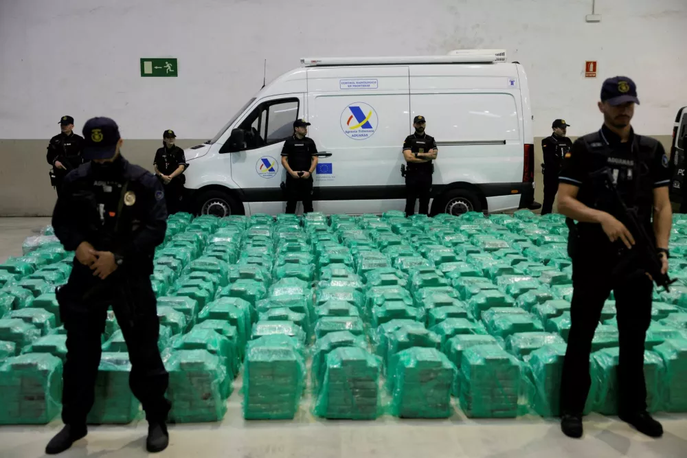 Spanish police display the 13 tons of cocaine, which was seized at the Algeciras port, hidden in banana shipments after it was transported in a container from Ecuador, at the port in Algeciras, Spain, November 6, 2024. REUTERS/Jon Nazca   TPX IMAGES OF THE DAY