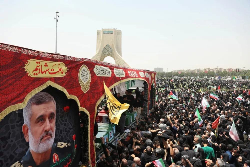 People attend the funeral procession of Iranian military commanders, nuclear scientists and others killed in Israeli strikes, in Tehran, Iran, June 28, 2025. Majid Asgaripour/WANA (West Asia News Agency) via REUTERS  ATTENTION EDITORS - THIS PICTURE WAS PROVIDED BY A THIRD PARTY