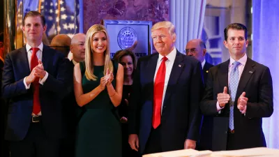 ﻿U.S. President-elect Donald Trump (C) smiles as he is applauded by his son Eric Trump (L) daughter Ivanka and son in law Jared Kushner (R) ahead of a press conference in Trump Tower, Manhattan, New York, U.S., January 11, 2017. REUTERS/Shannon Stapleton