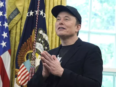 Elon Musk gestures as he speaks during a news conference with President Donald Trump in the Oval Office of the White House, Friday, May 30, 2025, in Washington. (AP Photo/Evan Vucci)