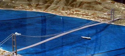 An undated file photo of a plastic model of what is to be the world's longest suspension bridge, a mega-span linking the Italian mainland to the island of Sicily across the torrid straits of Messina. Italy will announce on October 12, 2005 the winner of the contract to build the world's largest suspension bridge, a 4.4 billion euro (.3 billion) project linking the island of Sicily to the Italian mainland. The Messina Bridge project has been on the drawing board for nearly 40 years but has been snarled by problems ranging from bickering among planners to allegations of Mafia involvement. REUTERS/Tony Gentile