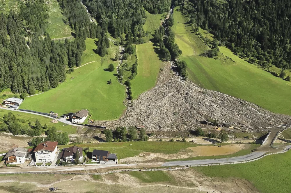 A mudslide covered homes and a street in the Gschnitztal valley in Tyrol, Austria, Tuesday, July 1, 2025. (BFV IBK-Land via AP)