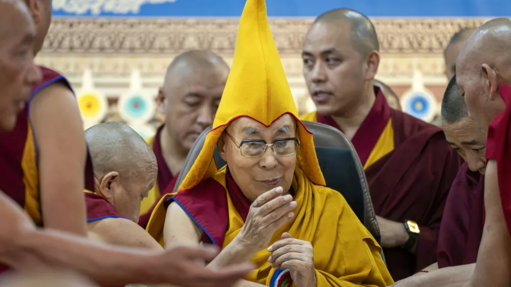 Tibetan spiritual leader the Dalai Lama presides over an event celebrating his 90th birthday according to a Tibetan calendar at the Tsuglakhang temple in Dharamshala, India, Monday, June 30, 2025, ahead of his birthday according to the Gregorian calendar on July 6. (AP Photo/Ashwini Bhatia)