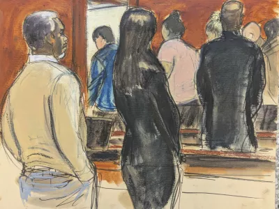 Sean 'Diddy' Combs, left, stands with his defense team, as he watches the jury file out after Judge Arun Subramanian instructed the jury to continue deliberations in Manhattan federal court, Tuesday, July 1, 2025, in New York. (Elizabeth Williams via AP)