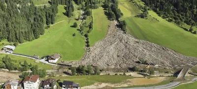 A mudslide covered homes and a street in the Gschnitztal valley in Tyrol, Austria, Tuesday, July 1, 2025. (BFV IBK-Land via AP)